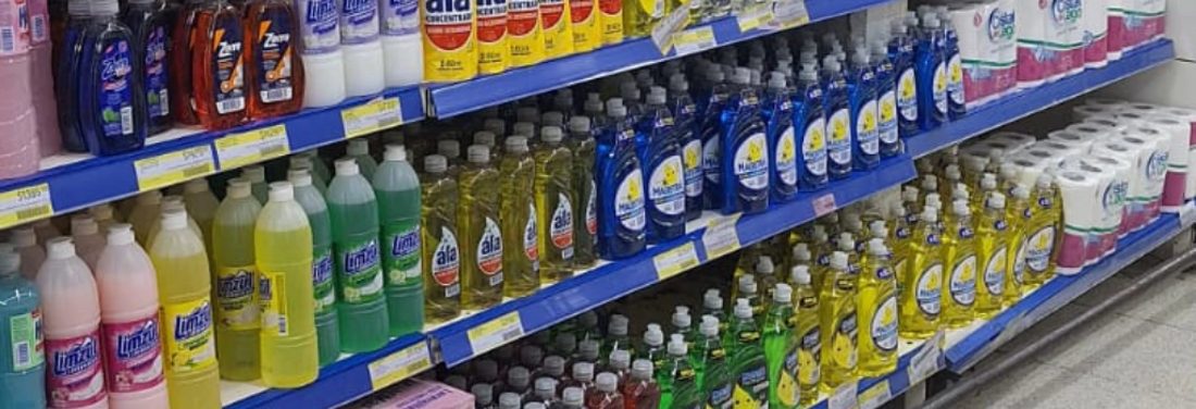 Detergent shelf with large yellow Limzul bottles on the left and blue Magistral bottles