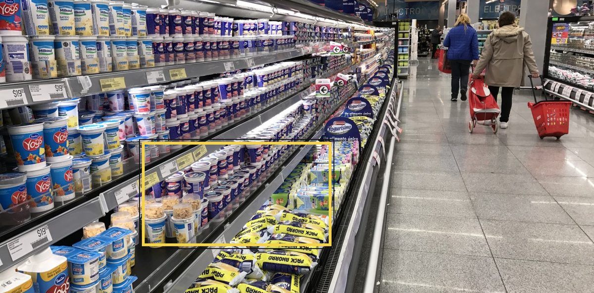 Full photo of the dairy fridge aisle, with the Yogurísimo cups on the third shelf boxed